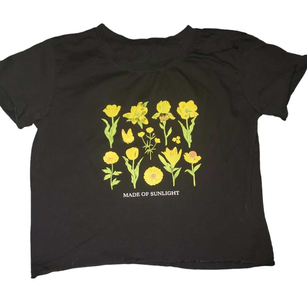A black croped t-shirt with flowers on it